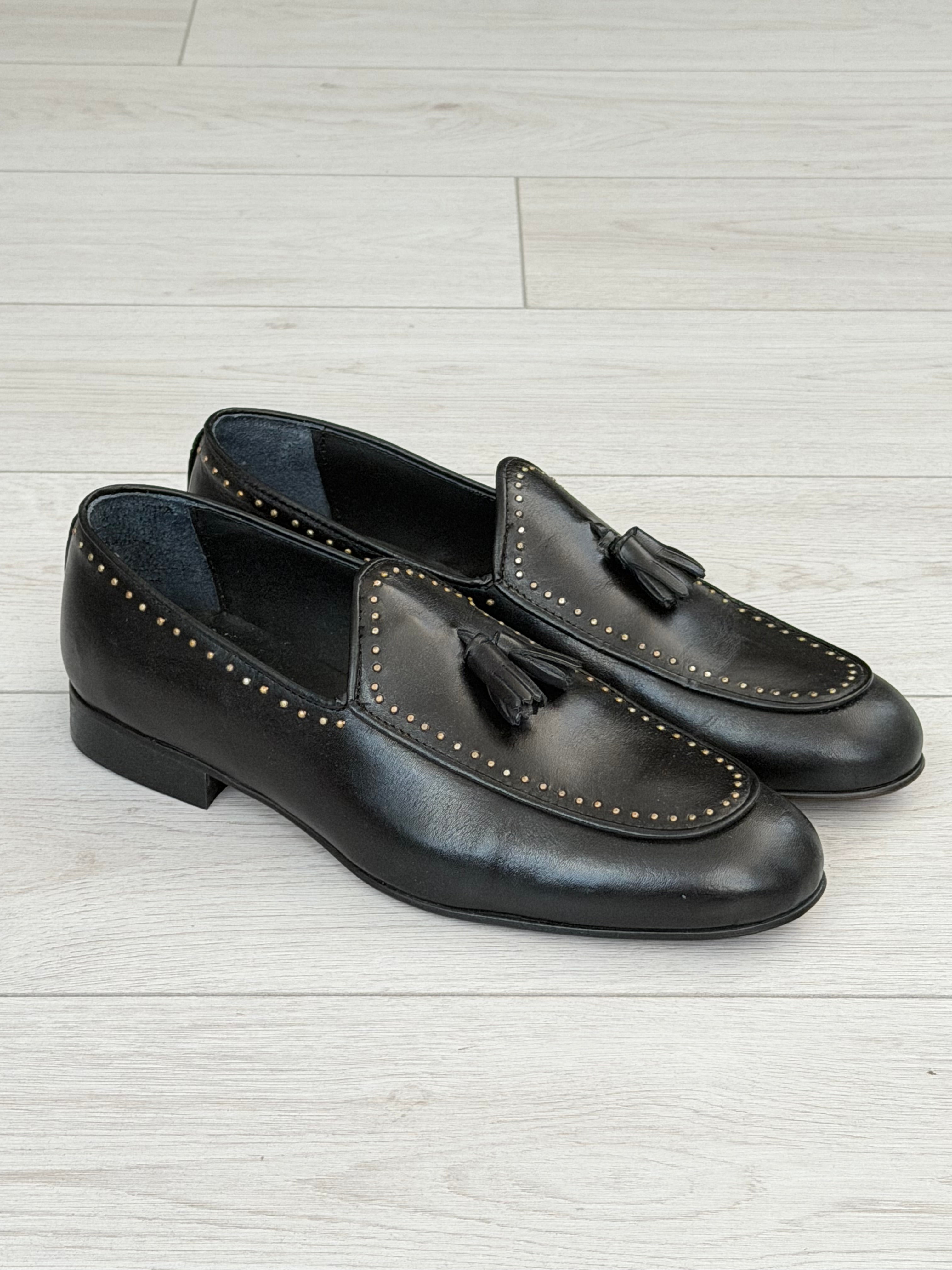 STUDDED LEATHER LOAFERS WITH TASSELS