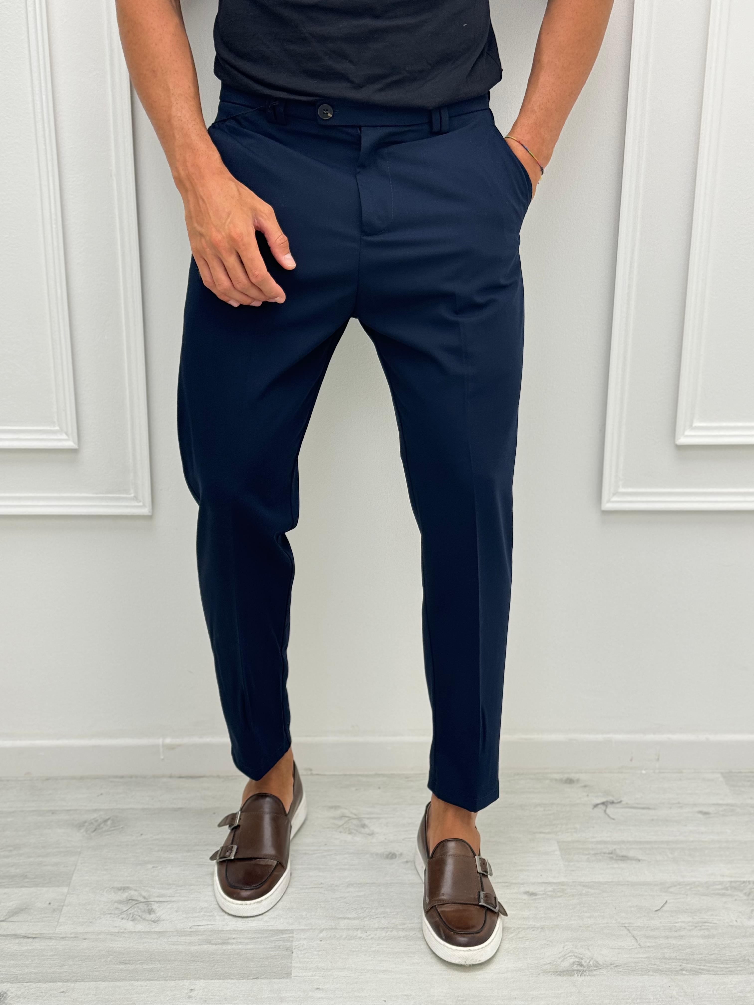 25 PANTALONE MOD CAPRI TASCHE DIETRO