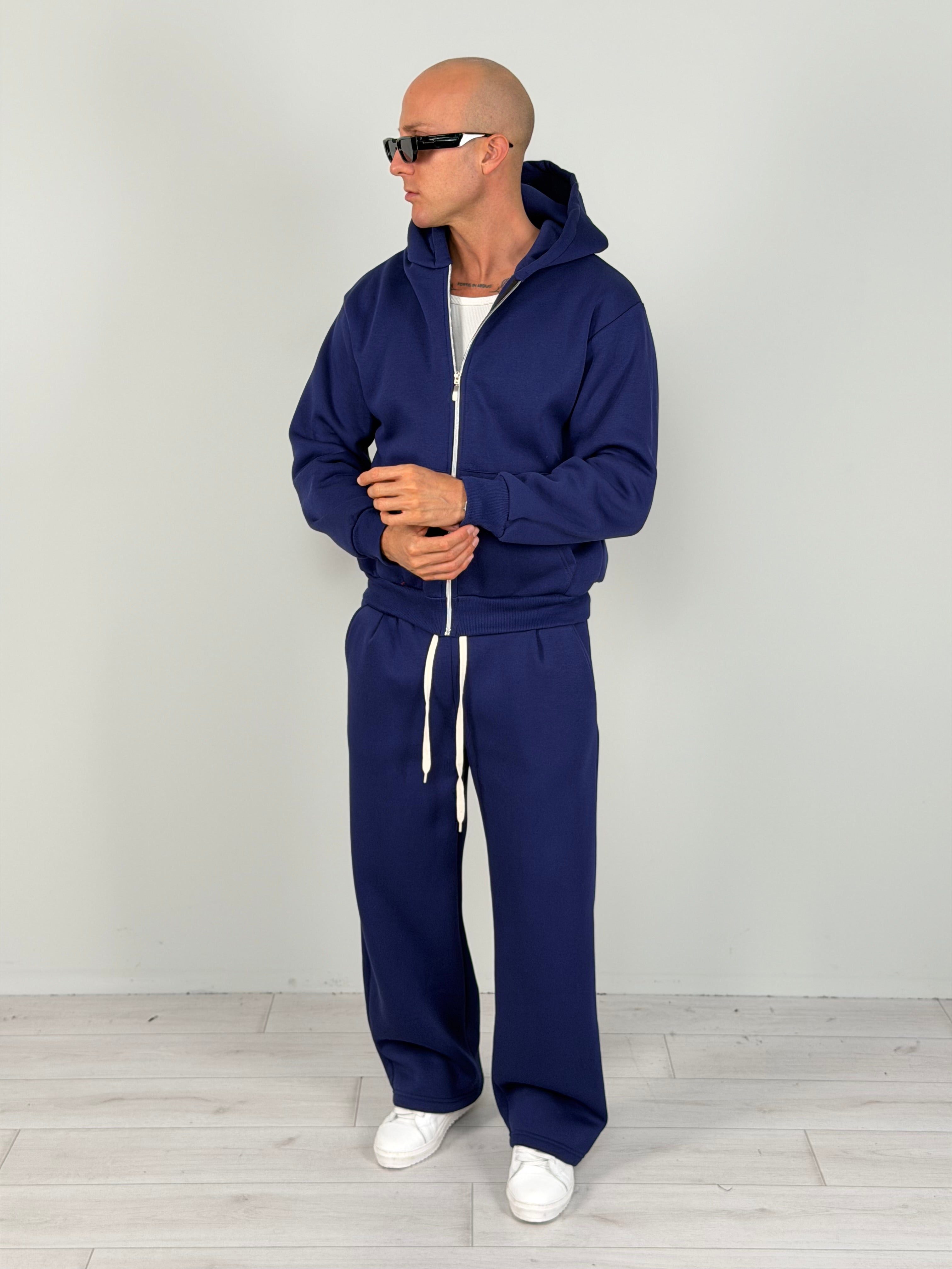 TUTA ZIP BOXY FIT FELPATA