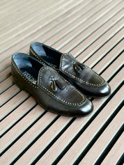 STUDDED LEATHER MOCCASIN WITH TASSELS