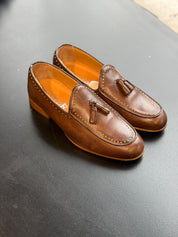 STUDDED LEATHER MOCCASIN WITH TASSELS