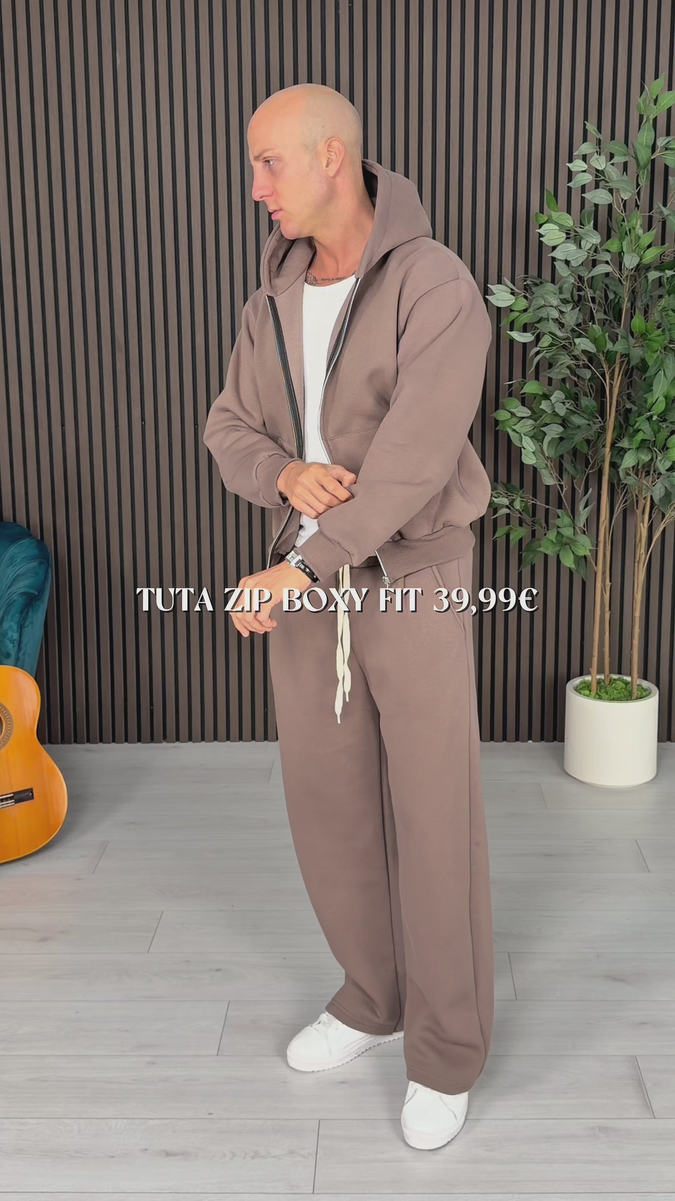 TUTA ZIP BOXY FIT FELPATA
